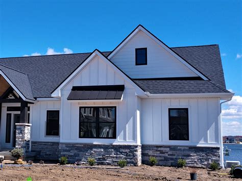 black and white metal house|residential white metal roof.